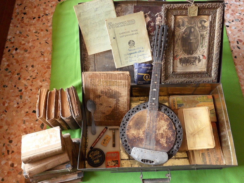Longarato Vittorio_Suitcase made of cans, banjo mandolin, music sheets.jpg