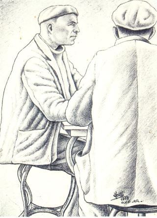 Two men sitting at a table.JPG