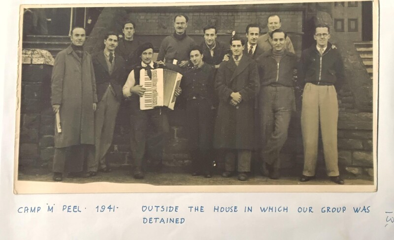 'Camp M Peel 1941. Outside the house in which our group was detained'