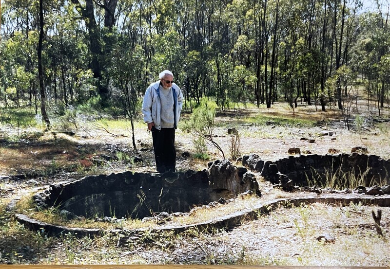 Mr Mitchell, Interpreter at the bridge of Murchison Camp No 13 in 2003